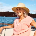 Retirement is all about going with the flow. a mature woman enjoying a relaxing boat ride